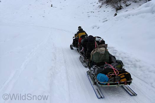 Snowmobile in Switzerland for backcountry skiing.