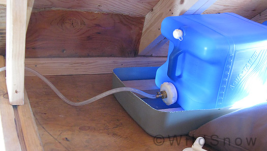 Water jug for backcountry skiing shelter.