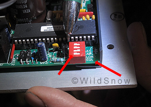 Inside back of controller, DIP switch number 4 indicated by arrows. 
