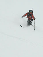 Carl backcountry skiing in the couloir. Snow was winded reverse density, not hero fluff, but fun anyhow.