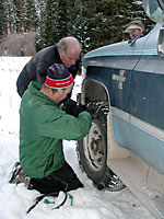 Chaining up for Montezuma is a local tradition. Nothing works better than a big beater Chevy for snow busting.