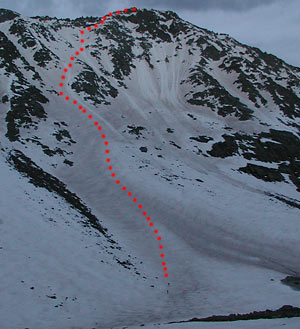 First look at El Diente from Rock of Ages area. Our goal marked in red. I thought the darker snow was all avy debris, Sean was more optimistic. Chris was silent. Carl knew he could ski anything. Attitude is everything...
