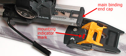 When you drop the main binding end cap in to the pocket in the heel latch unit, be sure it is within 1 millimeter of the mounting indicator mark, preferably exactly centered on the mark.