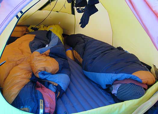 Louie and Lou's tent in real life, Expeds and Forty Below on the floor, Louie catching a snooze.