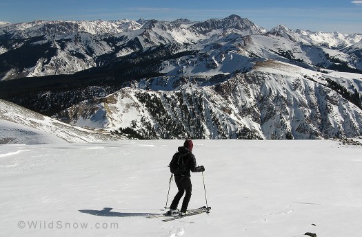 The classic image of skiing off Sopris summit. Looking east at Capitol Peak.