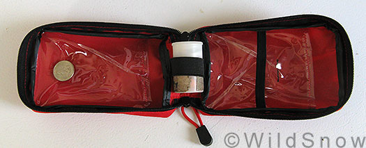 Backcountry skiing first aid kit, clamshell open.