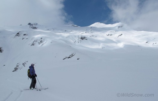 Lisa ponders the descent, we don't ski 5 or 6 thousand vert of powder that often.
