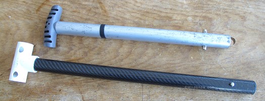 Conventional alu shovel shaft above would weight about 8 ounces at 20 inch length.