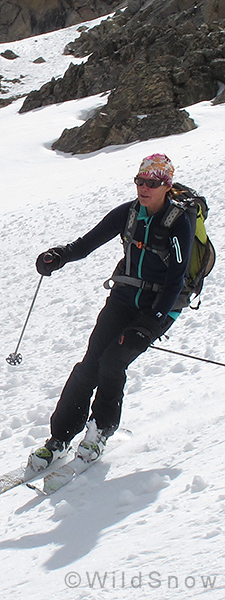 Lisa in Smartwool top, backcountry skiing.