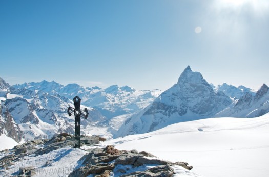 Summit of Tete Blanche.  The town of Zermatt is in the valley just to the right of the cross