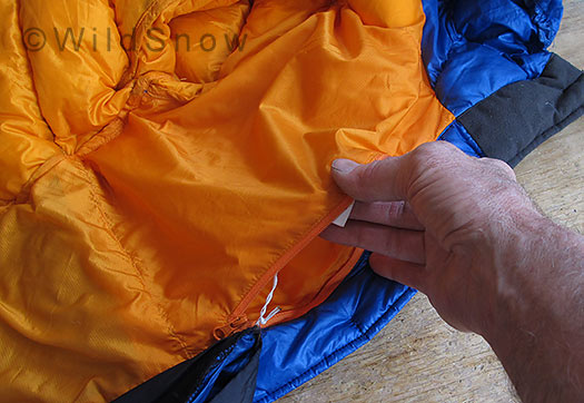 Interior vest pocket is too small to reverse and stuff the jacket in for storage.