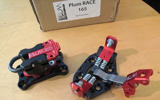 Plum Race includes a length adjustment track under the rear unit. Makes setup and mounting much easier.