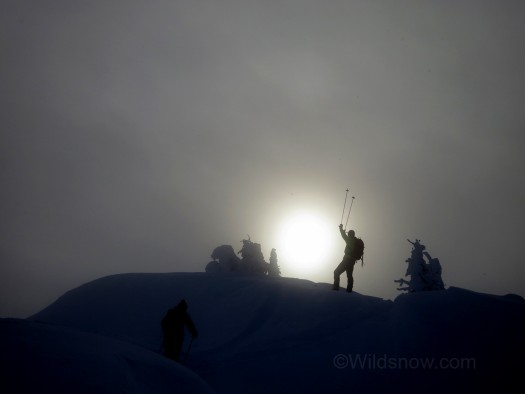 Reaching the top of a cloud layer on our first run of the day. Stoked!