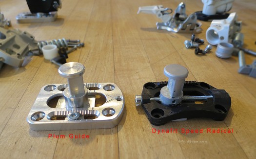 Binding heel bases with housing and release parts removed. Difference in length adjustment is obvious, as is difference in height (boot in Dynafit ends up 3 mm lower).