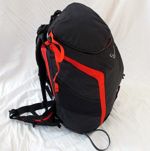  Ski carrying system and ice axe holder tuck away when not in use; handy skin pocket is easily accessed in the field. Skins can also be stuffed in the deep external mesh pocket on the left side of the pack.