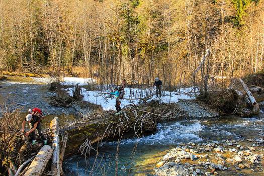 Crossing the Cascade River in the valley bottom.