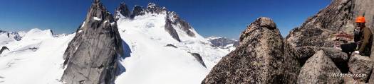 Enjoying a burrito and panoramic views of the Howsers and Pidgeon spire, halfway up Snowpatch spire.