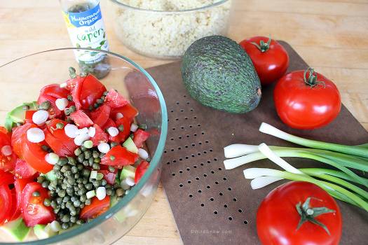 For picnic at the cabin, I whipped up a quinoa salad.  When summer veggies are fresh and ripe sometimes we like to eat them with dressing, just mixing them up to fully enjoy their flavor.  I chopped up these veggies on our new board and they tasted great.