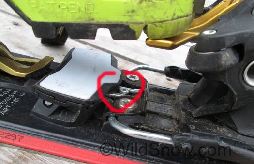 Once you slide the heel unit back for touring mode, you step down on the brake to clip it up for walking.  The mechanism for this is simple, as shown in photo the brake arms clip over a small steel stud.