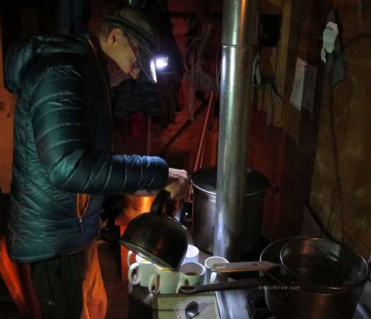 The most important task for Lou's headlamp is illuminating his preparation of hot buttered rum, yum, yum.