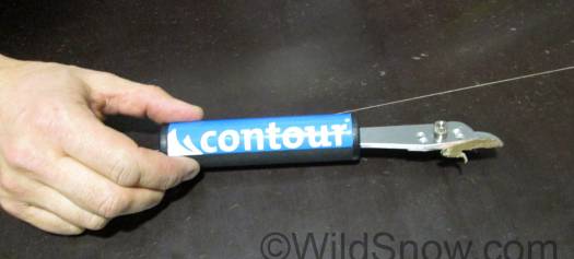 Contour dealer type skin cutter.  You'll want one if you cut more than a few skins a year.