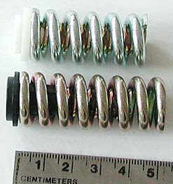 Naxo vertical release springs, photo is slightly distorted, older model at top measures 4 cm.