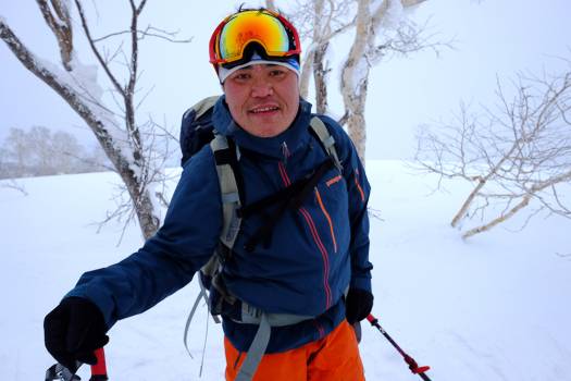 Mako, Japanese guide. Back in the day he raced skier-cross, but now shreds the deep pow of Hokkaido.
