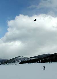 Louie flies the Black Beauty at Ruedi reservoir. First time getting a ride on skis, addictive!