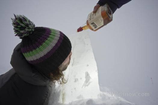 Cory sampling some of Glacier Bay's finest storm bound beverages.