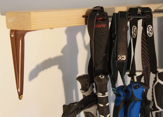 You can hang stuff from this type of rack including ski poles (if they have straps).