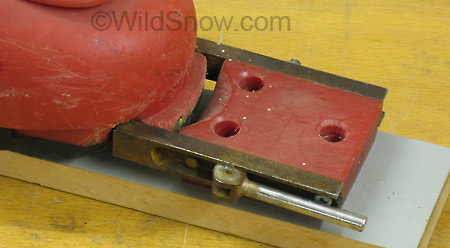 Detail of toe unit. The lever operates a cam used to lock and unlock the binding for downhill skiing or touring.
