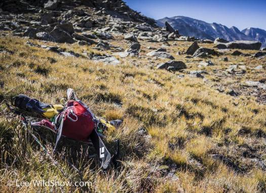 A ski pack might at first feel out of place in the golden tundra grass of summer, but in fact manages many motivational wonders in summer mountain exploration.
