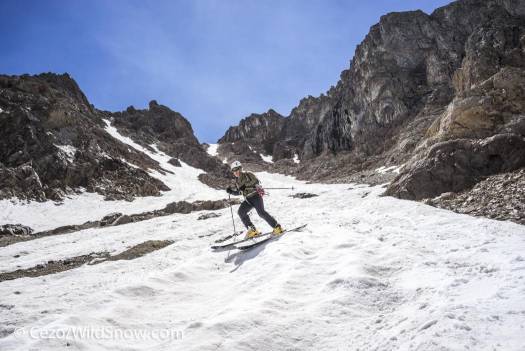 Alex exiting Grizzly Couloir after some 1200 vertical feet of Colorado August skiing. 