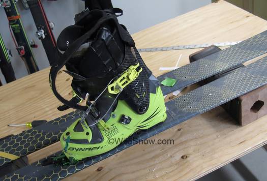 Binding toe installed, boot centered using the center-line I inked on the ski.
