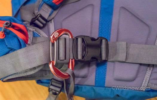 I also thought about using a simple ladder lock in place of the stock metal buckle. With the carabiner leg loop, the waist buckle strength theoretically doesn't matter. The carabiner is through a slot in the webbing, so if the plastic buckle fails, it will still stay attached, and keep the pack attached, in an avalanche. However, there isn't any redundancy in this system. If the non-locking carabiner came undone, and the plastic buckle broke (a fairly likely scenario), then the pack would be easily lost in a slide.