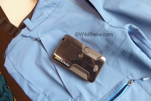 Sportiva side pocket is perfectly sized for beacon, rear pocket exists if you like that for your wallet.