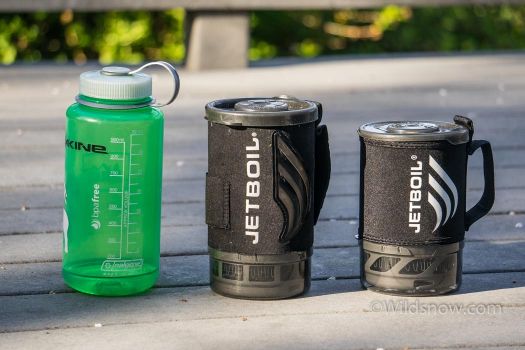 The MicroMo compared to a "standard" original jetboil size. (Nalgene for scale). The MicroMo has a smaller burner, so the fuel, burner, and fuel stand still fits inside the .8L pot. 