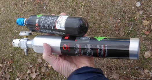 Downsized carbon cylinder if filled with nitrogen, about 327 grams -- NOT USER REFILLABLE. Larger cylinder, air filled, 666 grams.