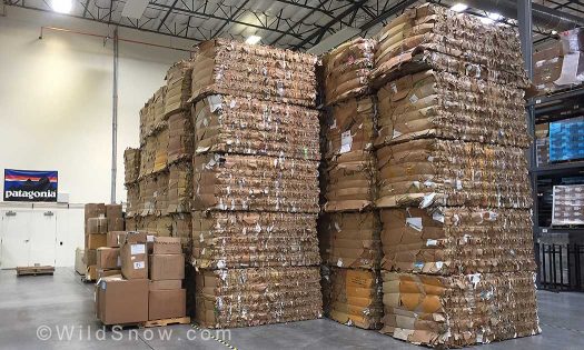 Stacks of recycled cardboard that will eventually be turned back into packaging for shipments.