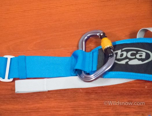 I've been using a carabiner for attaching my leg loop for years. BCA now includes a sewn slot that you can put  your own carabiner in. Nice.