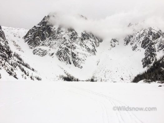 Looking back across Colchuck Lake at Dragontail Peak. Asgard pass, where we skied,is the run to the lookers left. 