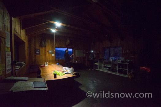 Inside the spacious hut. Check out that massive live-edge table.