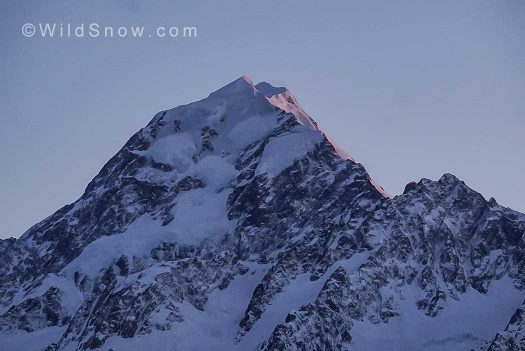 Pre-dawn alpenglow on Mt. Cook.