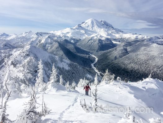 Hiking up to the King at Crystal, with beautiful Mt. Rainier National Park behind.