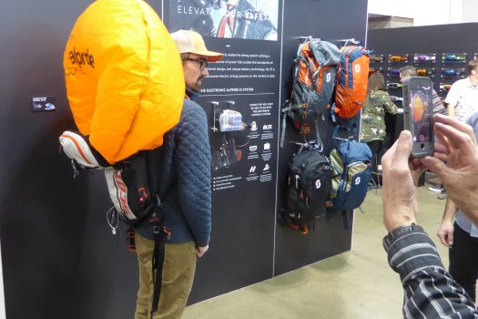 Louie trying it out, it filled in similar fashion to any other avalanche airbag backpack.
