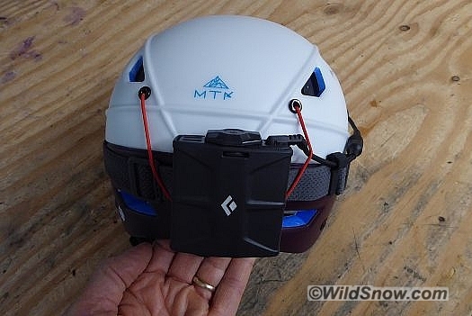 Goggle retainer also holds battery pack.
