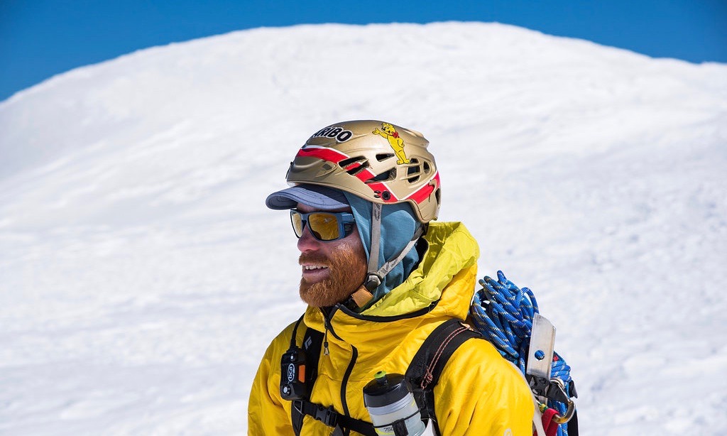 Hoods on helmets on hoods on hats. The ginger beard is a favorite springtime layering piece for sun protection. Layering is especially important on big exposed mountains where the climate can change many times- leaving the summit of Mt Rainier, WA. photo @alwaysadventuring.