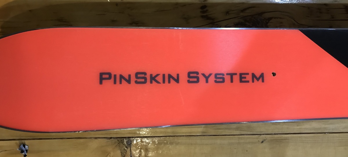 The PinSkin System will allow skiers to use eliminate tail clips by using a race skin with a pin that gets inserted in this hole. We didn't get to test out the system, yet.