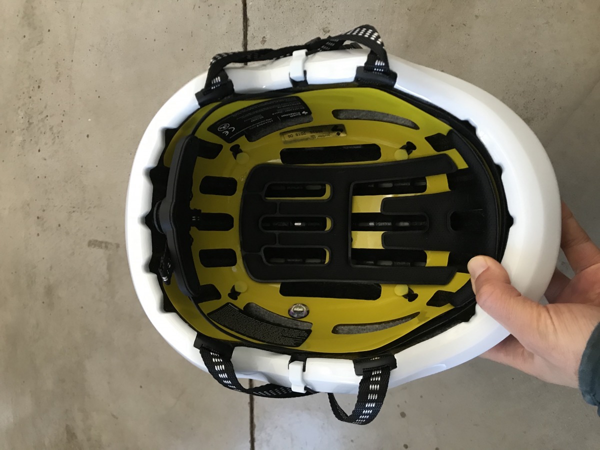 This particular model features MIPS (the Ascender is also available without). The yellow inner plastic is designed to reduce and slow brain rotation on impact in an effort to reduce causes of brain damage.