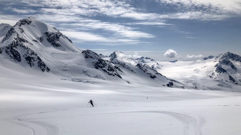Alex skiing towards the Eagle Glacier during a 40-mile day on race skis in the Chugach Mountains. Photo by Eric Dahl
